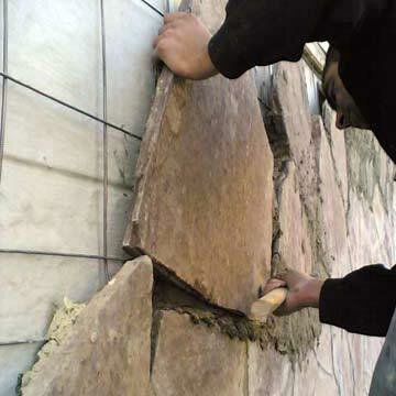 Povrchová úprava fasády domu pórobetonu kamene. Fotografie z Yandex obrázků služby