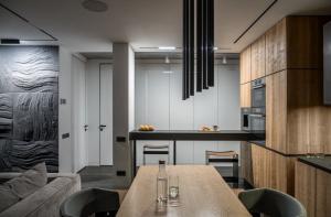 Jak bych oddělil kuchyň od obývacího pokoje v bytě-studio bez zdí. 6 nápadné řešení
